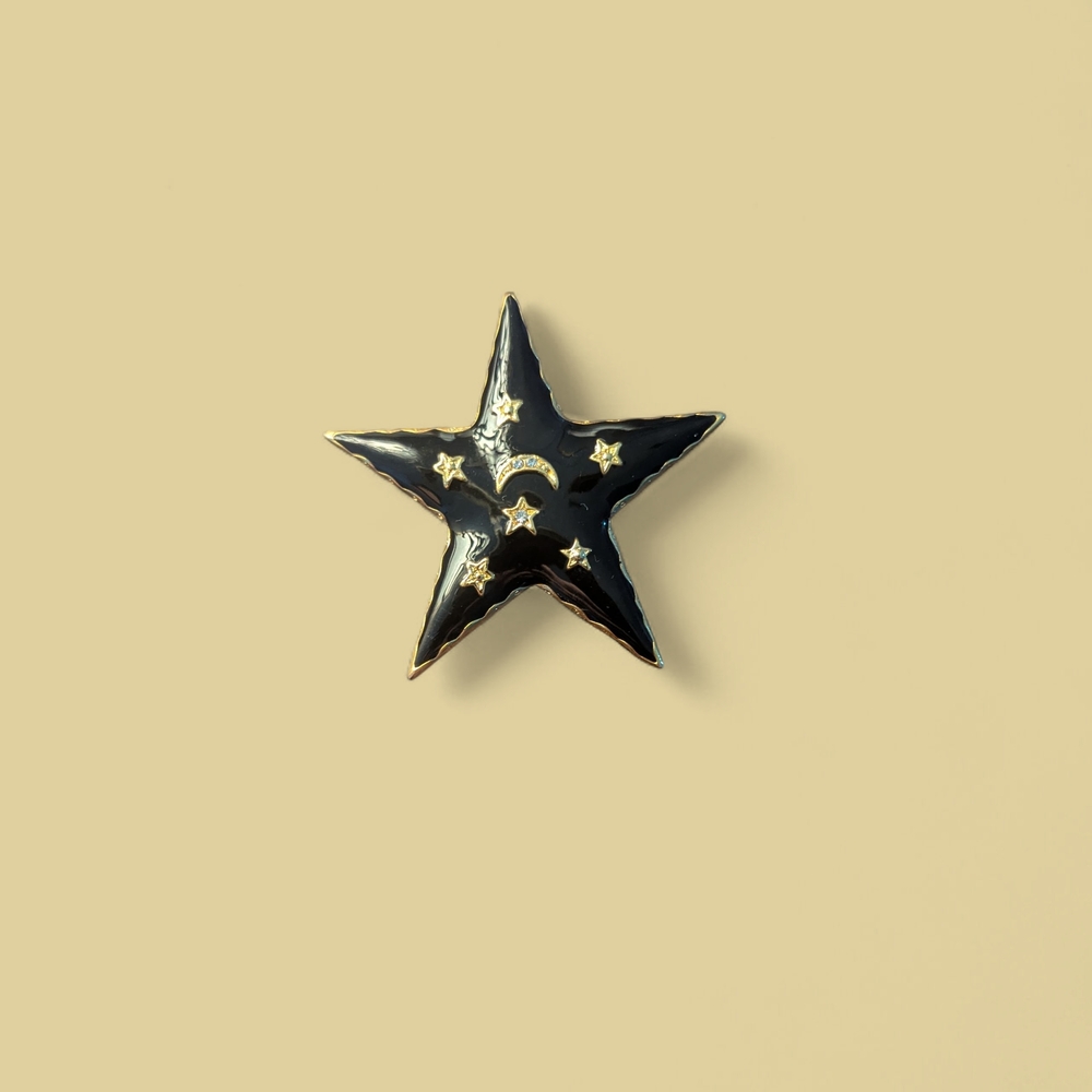 Black Star Brooch with Gold Accents - Women's Jewelry